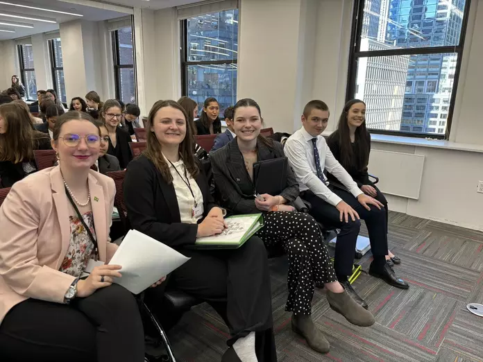 smiling students at a convention